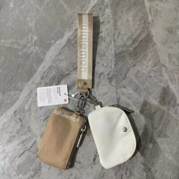 Brand new with tags Lululemon dual pouch keychain - Picture 1 of 1